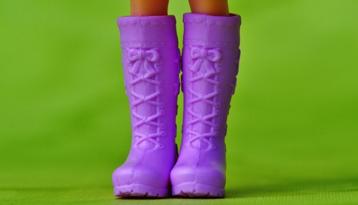 gambe di bambola con stivali