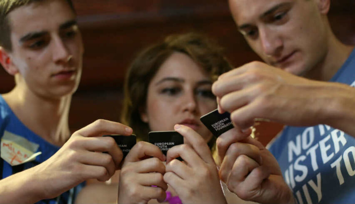 youth playing with EYF game