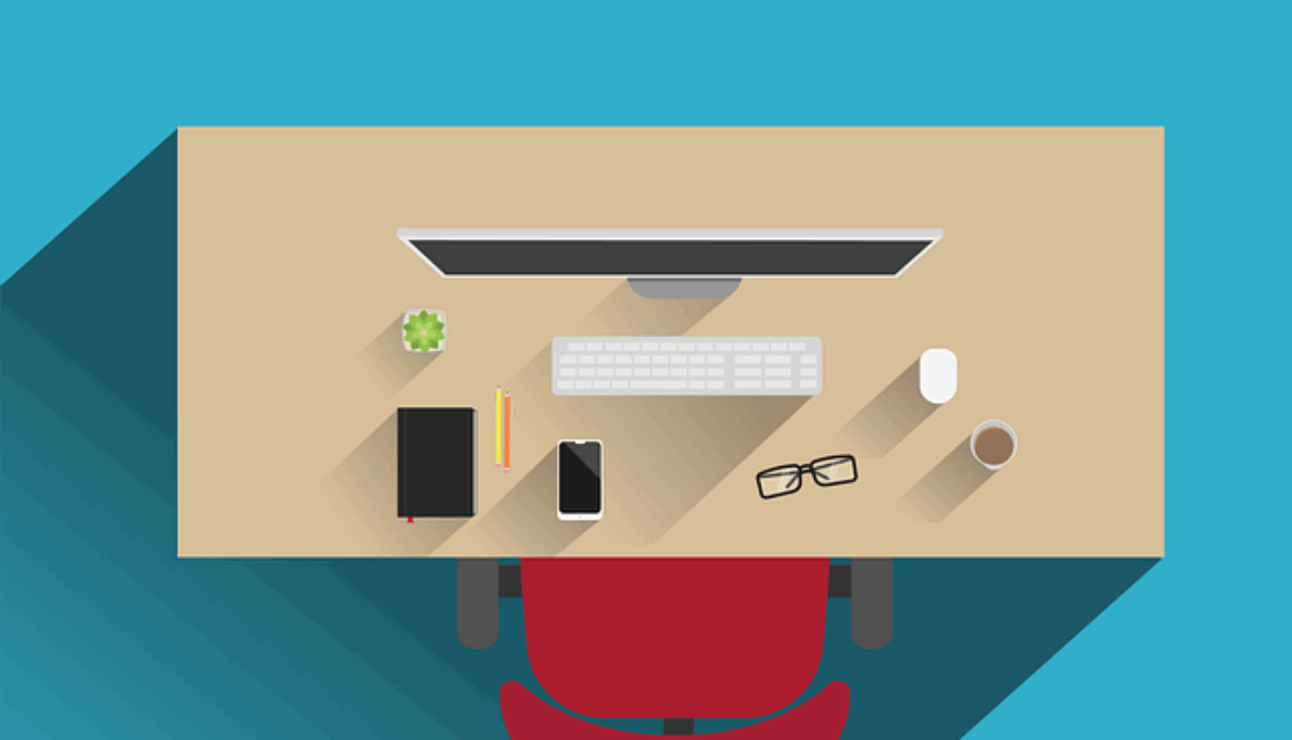 grafica raffigurante una scrivania vista dall'alto con pc, telefono, occhiali