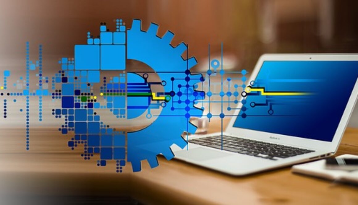 grafica con computer e ingranaggio di macchinario